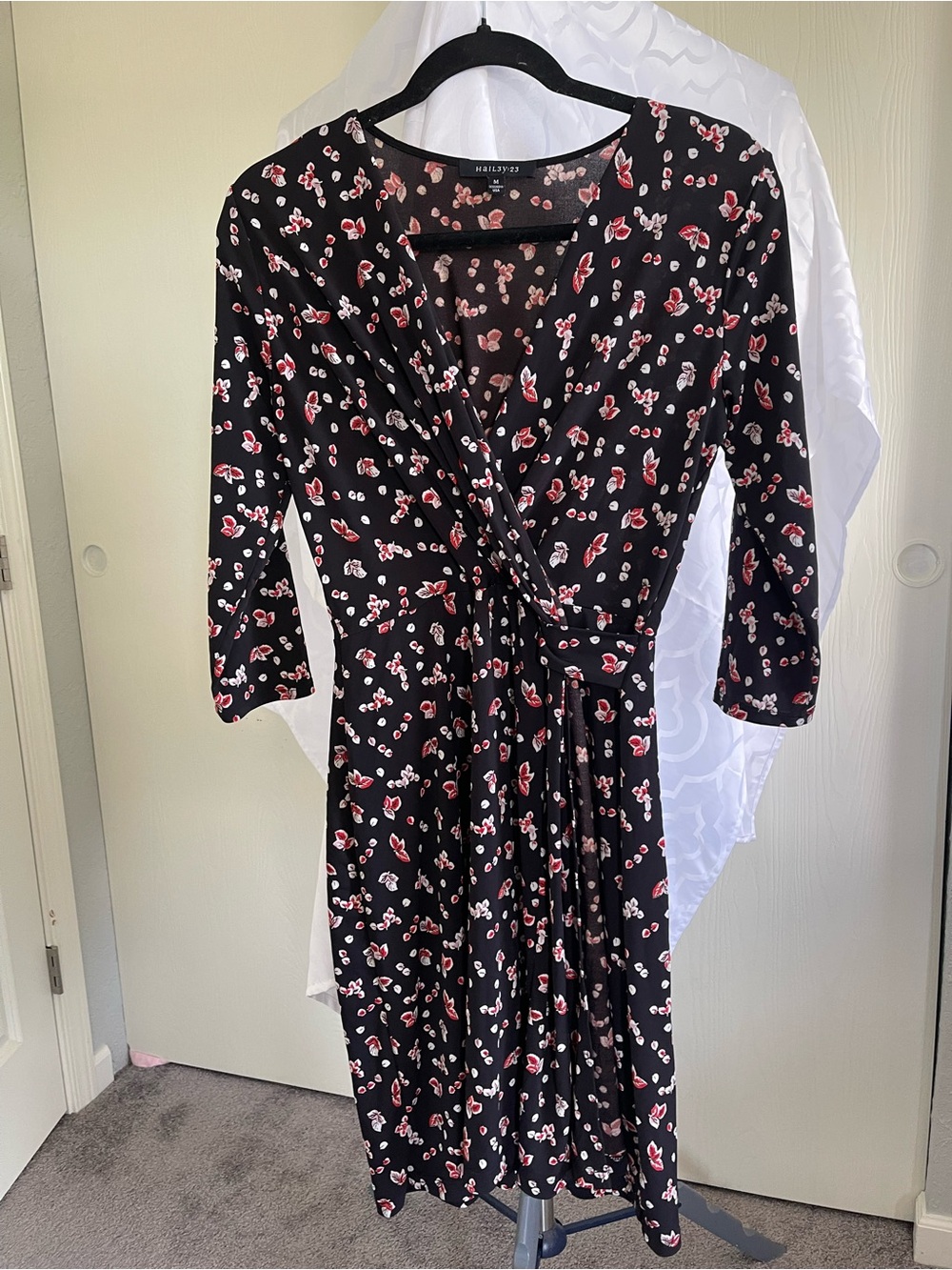Black Floral Wrap Dress with Red Accent Print